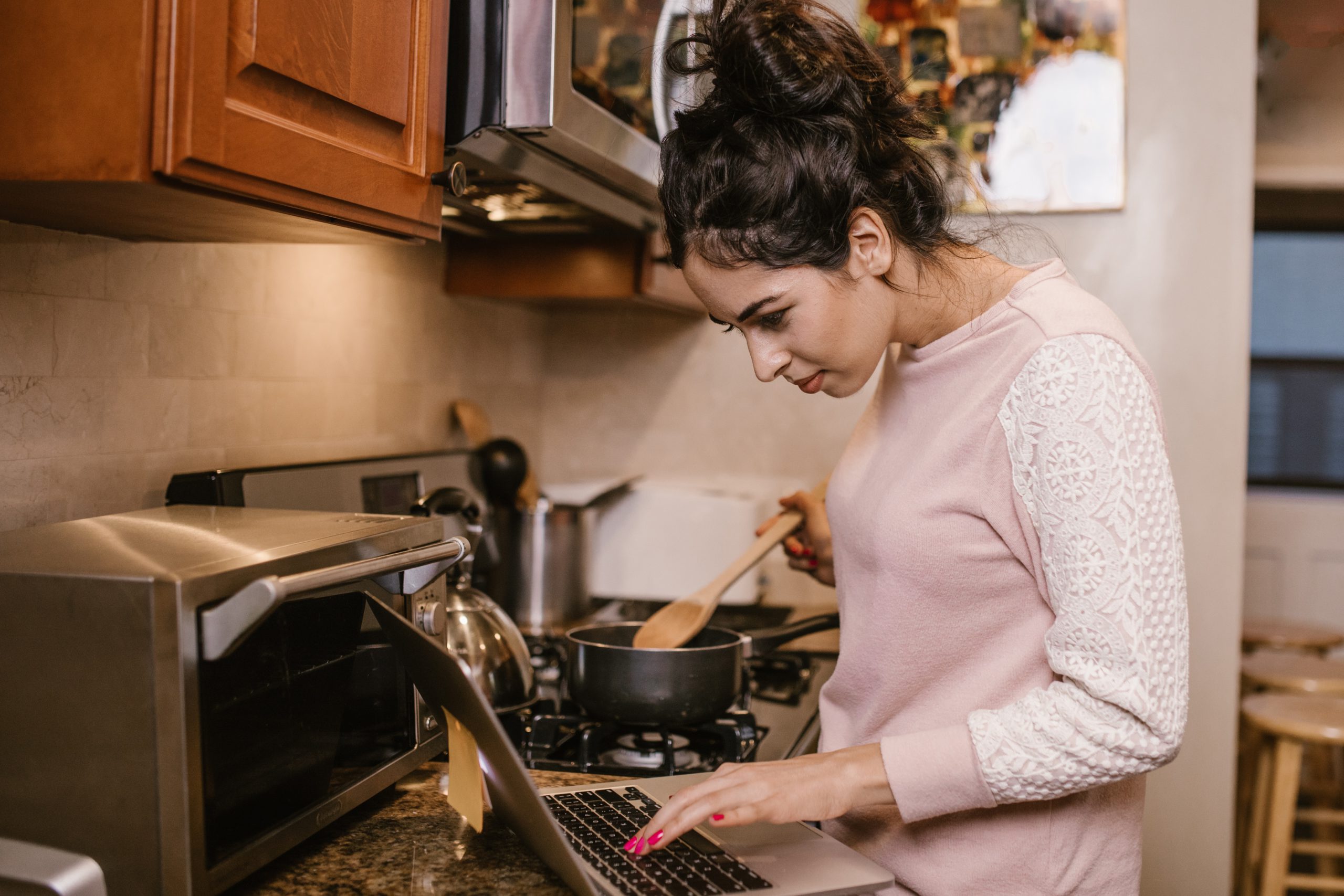 Girl learning to cook virtually